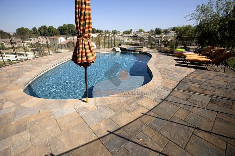 Beautiful home with pool deck pavers