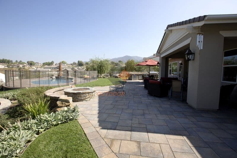 Elegant backyard patio with outdoor seating area